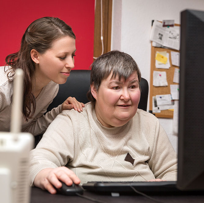 Disabled person using computer