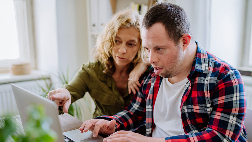 Teacher with disabled person